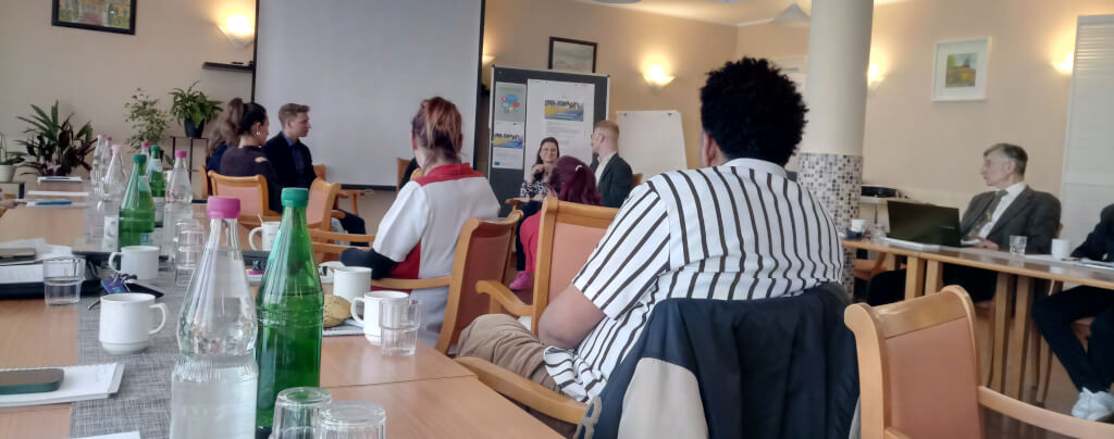 Transferworkshop 2026: Blick vom Publikum auf Gesprächsrunde